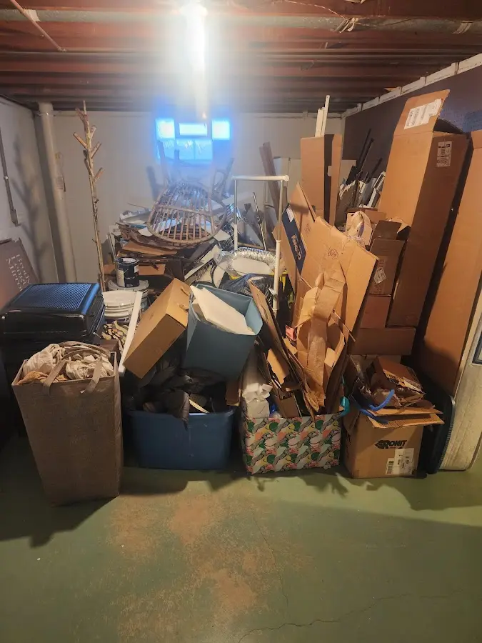 Roll-off dumpster container at job site for Yard Waste Dumpster Rental in Four Corners